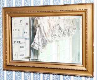 An Antique  Gilt And Plaster Framed Beveled Mirror