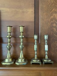 Two Pairs Of Brass Candle Holders.