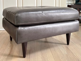 A Beautiful Modern Leather Ottoman By Crate & Barrel
