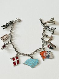 Sterling Silver Bracelet And Charms Including 1965 NY World's Fair