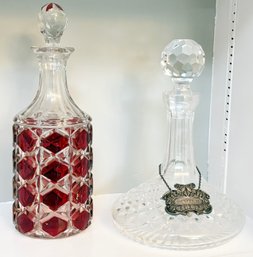 A Cranberry Glass And Cut Crystal Decanter