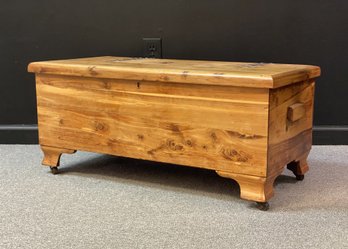 A Vintage Cedar Chest With Wood Casters By Lane