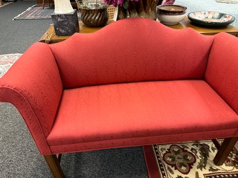 Nice Upholstered Love Seat With Decorator Pillows And Wood Legs