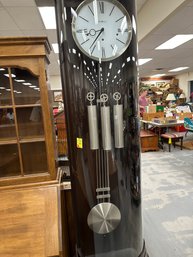 Howard Miller Contemporary Grand Father Clock, 100  Inch Tall By 18 Inch Wide,Estimated, $4,500