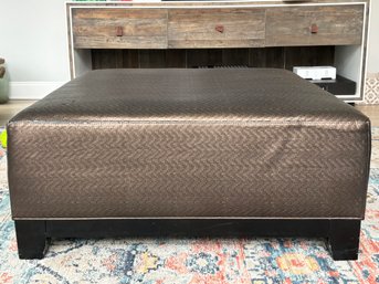 A Modern Woven Leather Coffee Table Ottoman