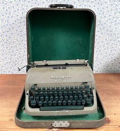 A Vintage Remington Typewriter In Original Case