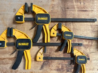 A Collection Of Dewalt Clamps