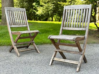 A Pair Of Hampton Bay Teak Folding Chairs