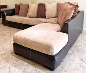 A Modern Leather And Suede Sectional