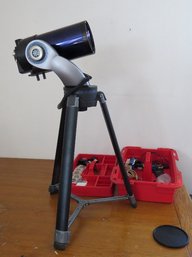 A Meade FXT 125 Telescope With Accessories And Craftsman Tote