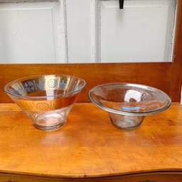 A Group Of Two Glass Bowls