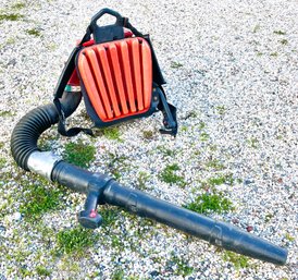 A Redmax Backpack Gas Powered Leaf Blower