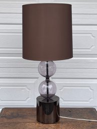 Contemporary Double Glass Orb Table Lamp With Brown Fabric Shade