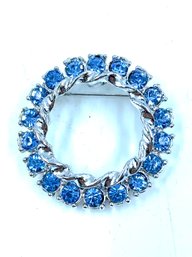 Signed Vintage Gerry's Silvertone & Blue Stone Wreath Brooch