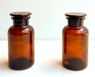 A Pair Of Vintage Amber Glass Apothecary Jars By CB2