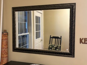 LARGE BEVELED MIRROR AND A BOLT OF FABRIC