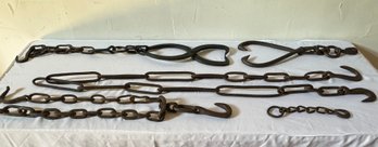 Two Antique Logging Tongs, Three Iron Hooks & Chains