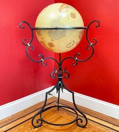 A Library Globe On Wrought Iron Stand