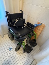 A QUICKIE AUTOMATIC WHEELCHAIR