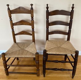 Two Antique Ladder Back Rush Seat Chairs