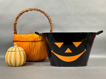 A Selection Of Halloween Items: Pumpkin Basket, Tub & Candle