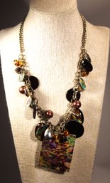 COSTUME NECKLACE HAVING LARGE ABALONE SHELL PENDNT & CHARM PENDANTS