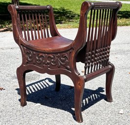 An Antique Carved Mahogany Hall Seat