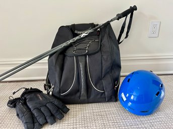 Boot Bag, Ski Poles, Gloves, And Helmet