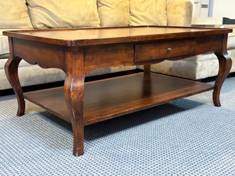 A Mahogany Coffee Table With Storage Drawers By Grange Furniture