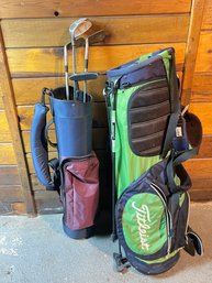 Pair Of Golf Bags With A Few Clubs