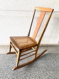 Vintage Solid Wood Rocking Chair W/ Cane Seat By Brown Bros Furniture Gardner, Mass.
