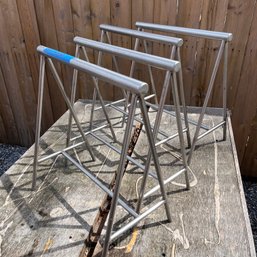 A Set Of 4 Stainless Catering Tray Stands