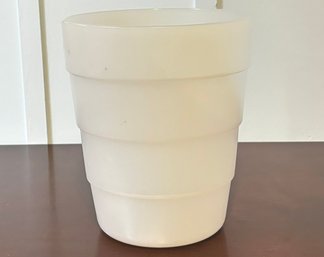 An Acrylic Wastebasket