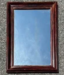 An Antique Mahogany Mirror