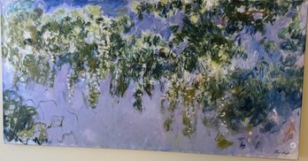 A DECORATIVE CLAUDE MONET PRINT ON CANVAS