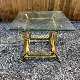 A Brass Base Glasstop Table