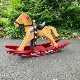 A Radio Flyer Wooden Rocking Horse