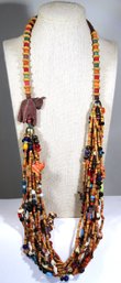 Large 1980s Wood And Bone Beaded Necklace Having Charms Glass Beads Elephants