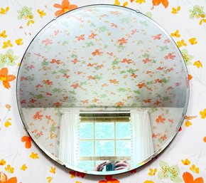 A Vintage Beveled Frameless Round Mirror