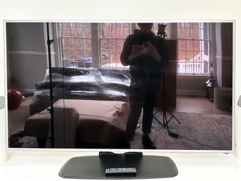 A Samsung 60 Inch Flat Screen TV