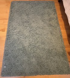 A CONTEMPORARY SHAG AREA RUG