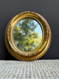 Small Gilded Oval Mirror