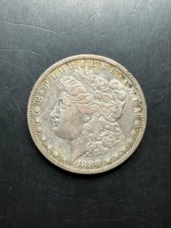 Toned 1889-O Morgan Silver Dollar