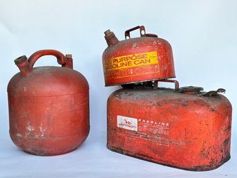 A Trio Of Vintage Gas Cans