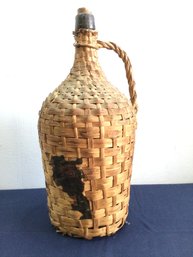 Basket Woven Covered Wine Bottle