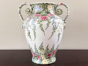 A Large Hand Painted Ceramic Vase With Floral Motif