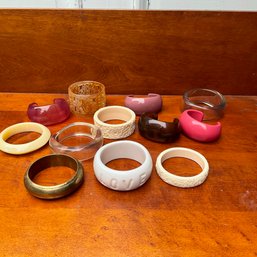 An Assortment Of Bengles And 4 Cuffs