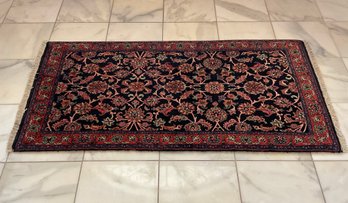 Wool Area Rug With Red And Black Tones