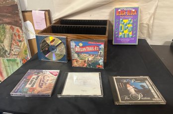 Entertainment Treasure Lot Music CD's, Computer Games And With Wooden CD Holder. BS/D2