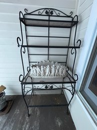 A WROUGHT IRON ETAGERE